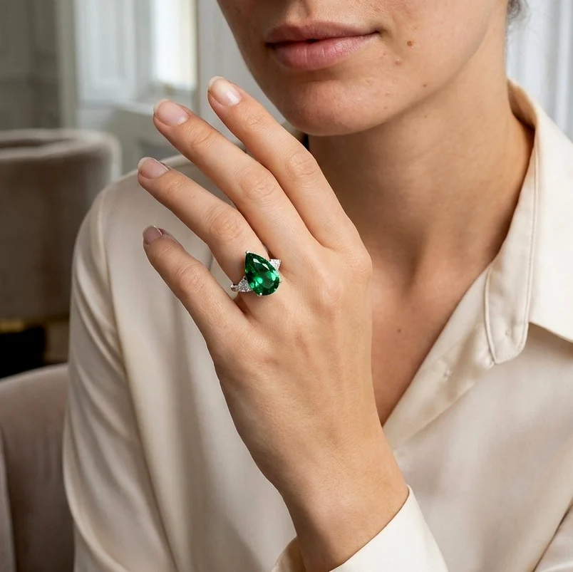 IGI Certified 12.00ct Fancy Vivid Green Pear Diamond Trilogy Ring in Platinum